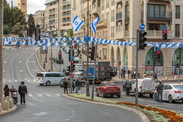 Jerusalem, Israel, May 8, 2019: Israeli people in Jerusalem old city on Remembrance Day with israeli flags, Israel