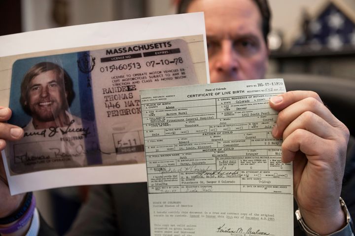 U.S. Marshal Peter J. Elliott holds Ted Konrad's birth certificate and copy of his driver's license on December 16, 2021 at the U.S. Courthouse in the Carl B. Stokes case in Cleveland. 