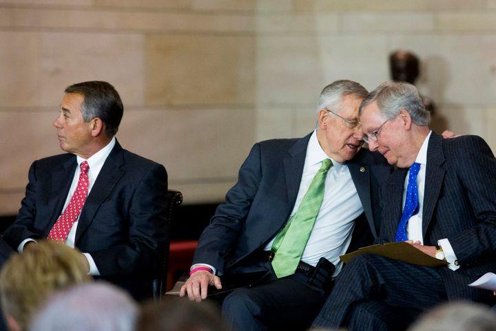WASHINGTON, DC - DECEMBER 10: (L-R) Speaker of the House John Boehner (R-OH), Senate Majority Leader Harry Reid (D-NV) and Senate Minority Leader Mitch McConnell (R-KY) attend a Congressional Gold Medal Ceremony for World War II era Civil Air Patrol members, on Capitol Hill, December 10, 2014 in Washington, DC. Sixty-five members of the Civil Air Patrol lost their lives in the line of duty during World War II. (Drew Angerer/Getty Images)