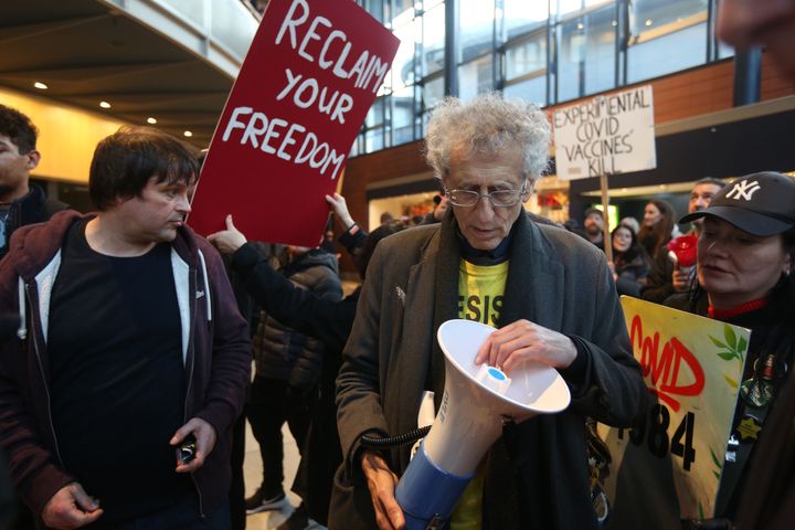 Piers Corbyn and protesters forcibly enter the theatre to protest against vaccine passports.