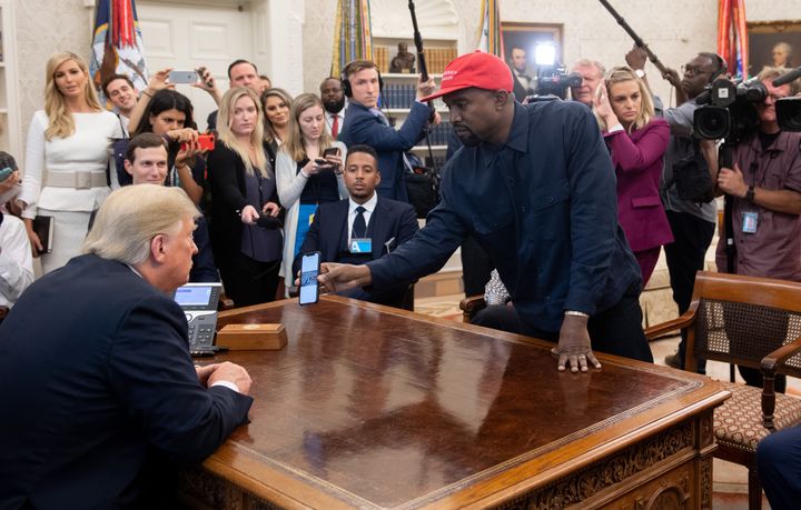 Then-President Donald Trump meets with rapper Kanye West in the Oval Office of the White House in Washington, D.C., on Oct. 11, 2018.