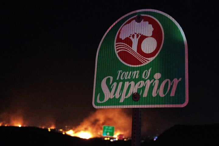 Flames engulf homes as the Marshall Fire spreads through a neighborhood in the town of Superior in Boulder County, Colorado, on Dec. 30, 2021.