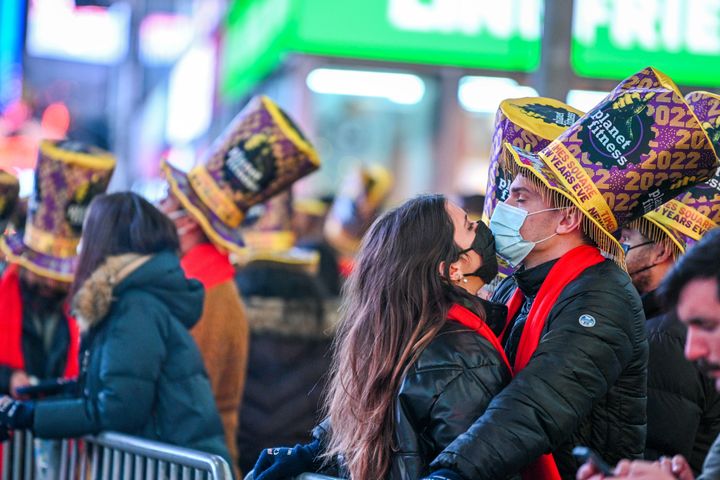 Unidentified revelers ring in the New Year at Times Square.