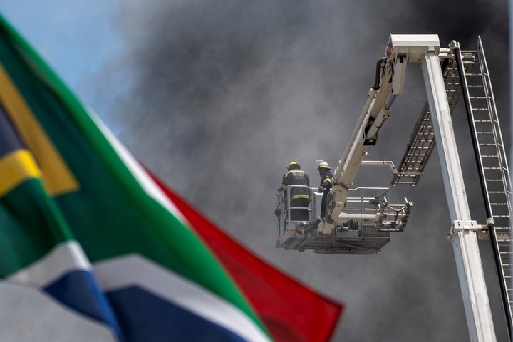 Firefighters are still working on “hotspots” in the National Assembly building more than 24 hours after the fire started.