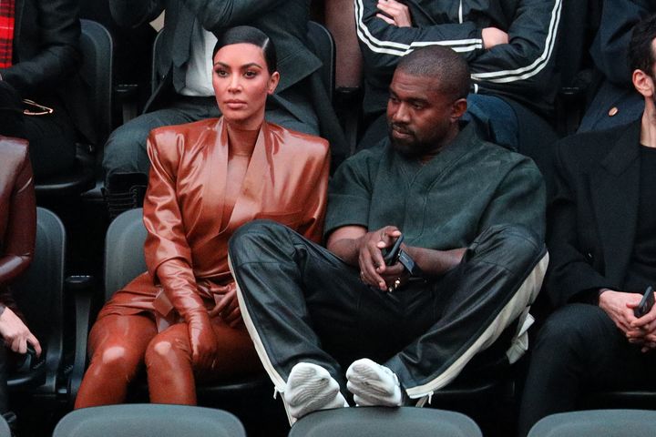 Kim Kardashian and Kanye West attend the Balenciaga show in Paris in early March 2020.