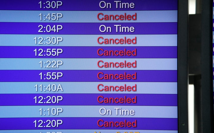 The departure board for Southwest Airlines on Jan. 3, 2022, in the main terminal of Denver International Airport in Denver.