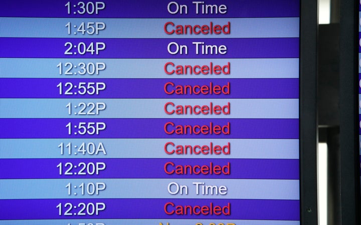 The departure board for Southwest Airlines on Jan. 3, 2022, in the main terminal of Denver International Airport in Denver. 