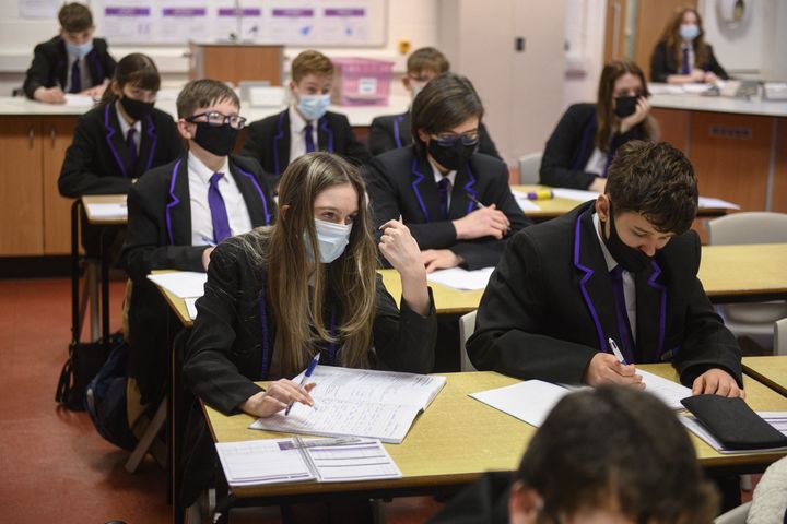 Year 10 students wearing face masks at Park Lane Academy in Halifax, northwest England on January 4, 2022. 