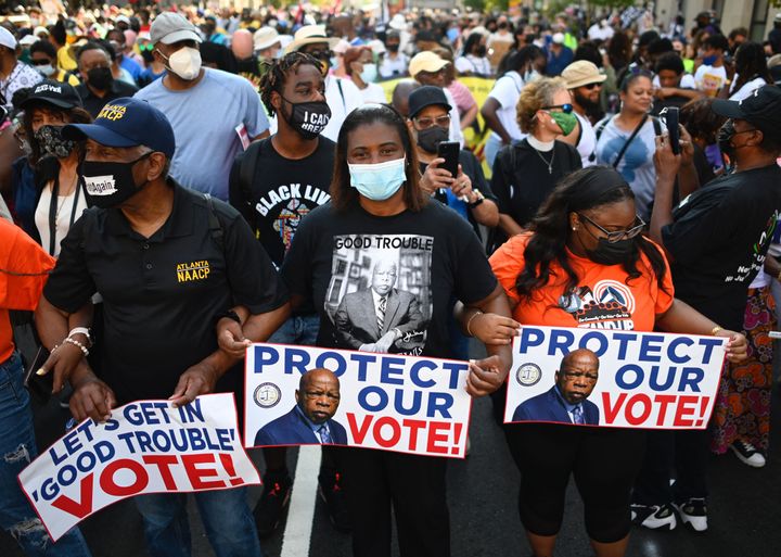 Major demonstrations in the past year have called on Democrats to pass new federal laws protecting voting rights. But the party's major legislation is bogged down in the Senate, where Democrats spent most of 2021 focused on other priorities.