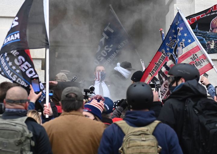Trump supporters get tear gassed outside the Capitol in Washington, D.C., on Jan. 6, 2021.