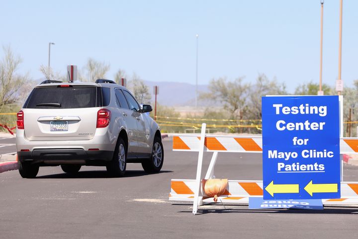 Those terminated this week are welcome to reapply to future job openings if they get vaccinated at a later date, the clinic said. An SUV arrives to a testing site for the coronavirus at Mayo Clinic in Phoenix, Arizona.
