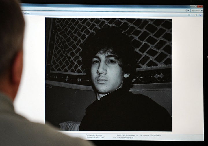 A man looks in Moscow on April 19, 2013, at a computer screen displaying an undated picture the 19-year-old Dzhokhar Tsarnaev posted on his page in VKontakte, a Russian social media site.