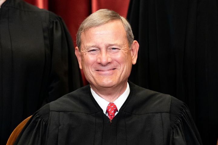 Chief Justice John Roberts poses during a group photo of the Justices at the Supreme Court in Washington, U.S., April 23, 2021.