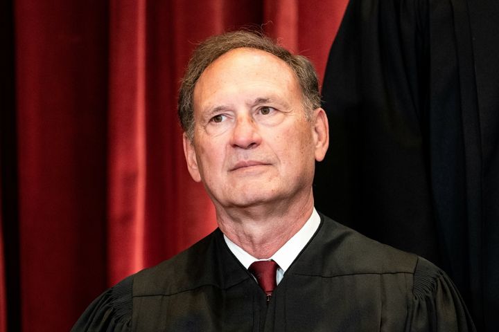 Associate Justice Samuel Alito poses during a group photo of the justices at the Supreme Court in Washington on April 23, 2021. 