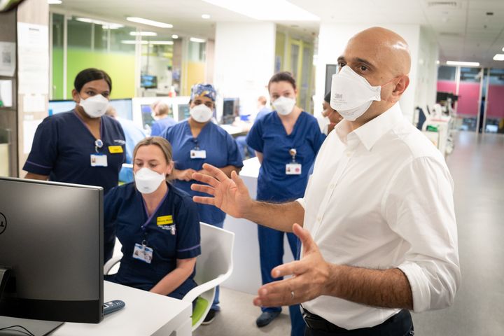 Health secretary Sajid Javid meets staff in a Covid Intensive Care Unit during a visit to Kings College Hospital in London on Friday.