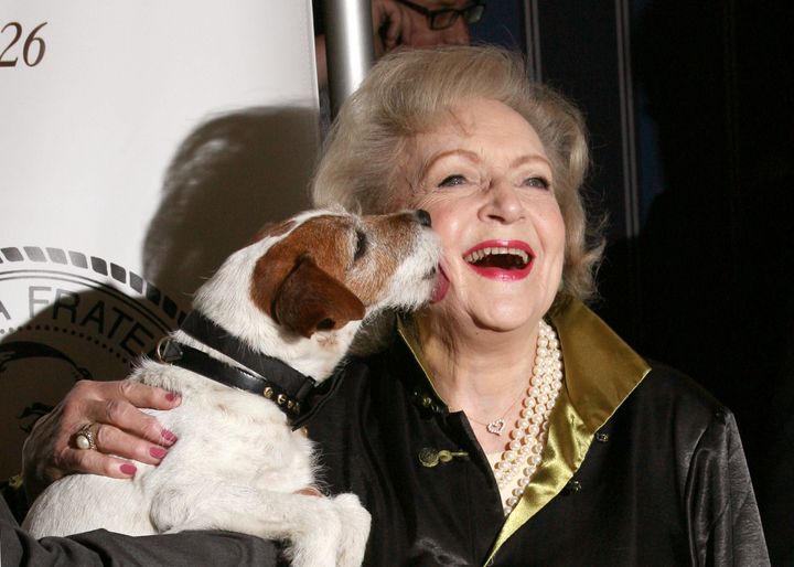 Betty White and Uggie, a dog actor, in New York City in 2012.