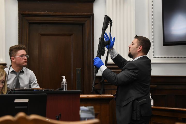 Dominick Black said he bought Kyle Rittenhouse's AR-15 rifle for him because Rittenhouse was underage. He's shown Rittenhouse's rifle by Kenosha Police detective Ben Antaramian during the Kyle Rittenhouse trial in November.