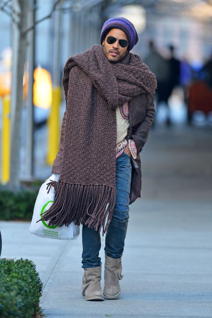 Lenny Kravitz wearing a giant knit scarf in 2012.