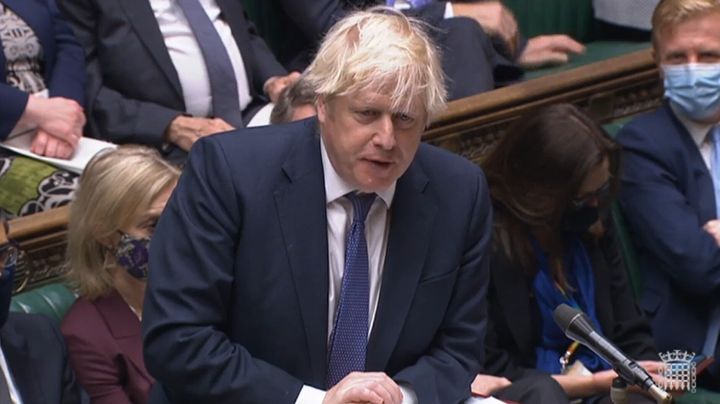 UK Prime Minister Boris Johnson answers questions from members of Parliament. 
