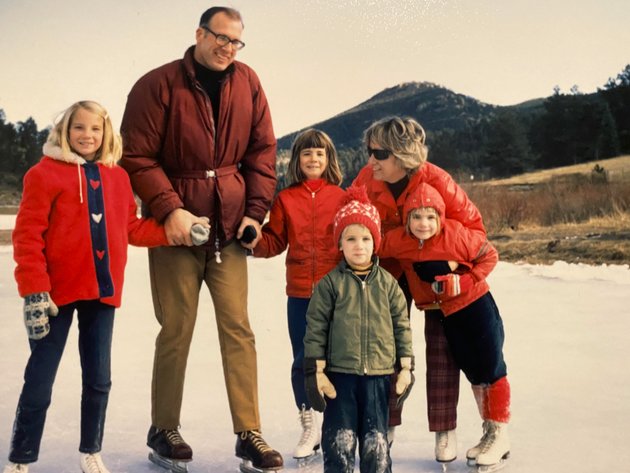 The author (center) with her little brother (in the green coat) and the rest of their family in 1969.