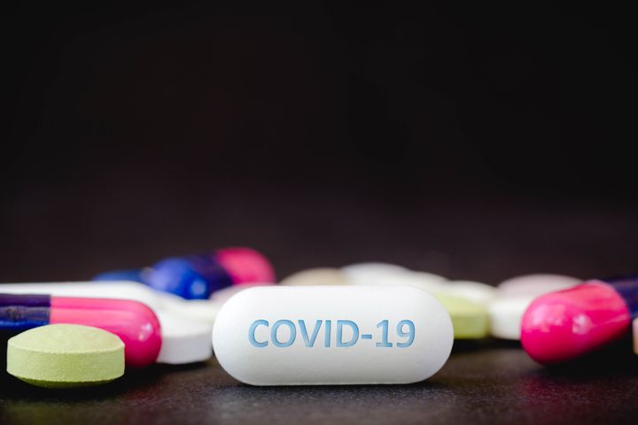 BRAZIL - 2021/04/19: In this photo illustration, medicine pills and the text COVID-19 in one pill seen displayed. (Photo Illustration by Rafael Henrique/SOPA Images/LightRocket via Getty Images)