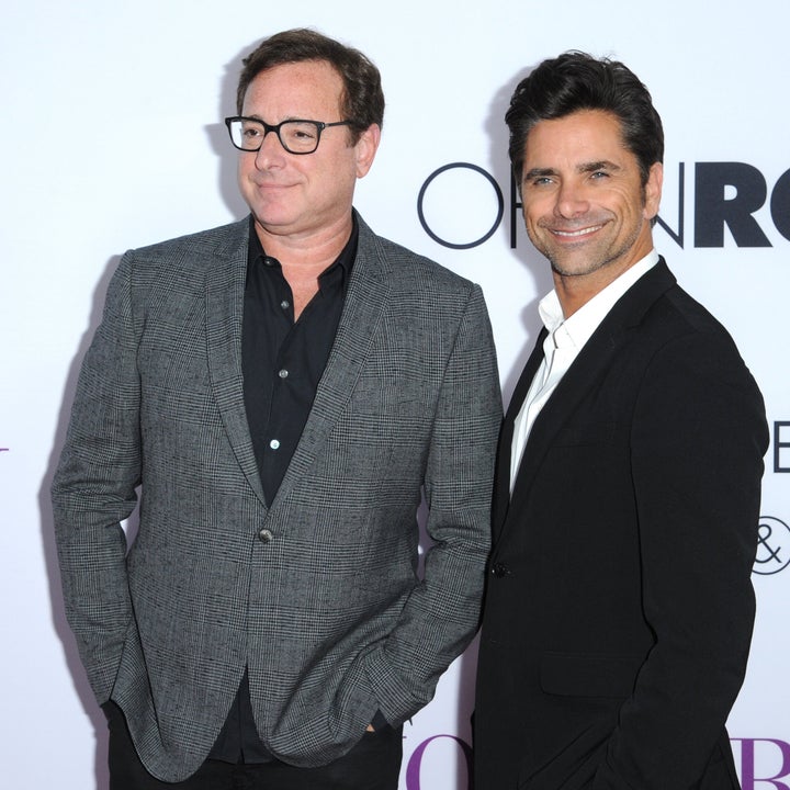 Happier times: Bob Saget and John Stamos arrive at the Los Angeles premiere of "Mother's Day" in 2016.