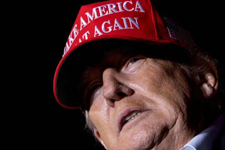 Former President Donald Trump waits to speak at a rally in Florence, Arizona, on Saturday.