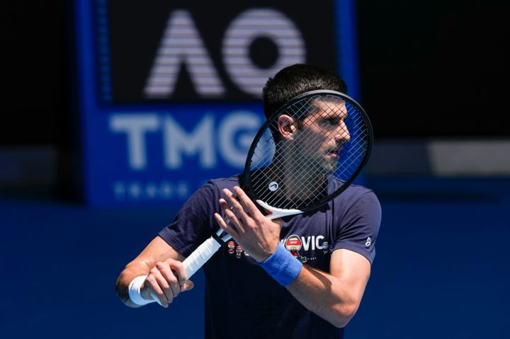 Novak Djokovic practices on Rod Laver Arena ahead of the Australian Open tennis championship in Melbourne, Australia, Jan. 12, 2022. (AP Photo/Mark Baker, File)