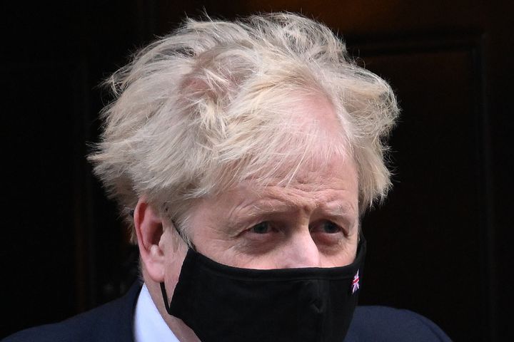 Prime Minister Boris Johnson leaves 10 Downing Street For PMQ's on January 12, 2022 in London.