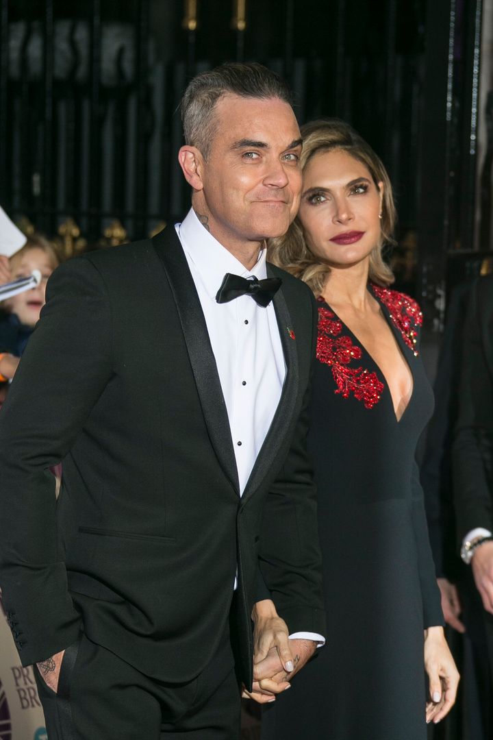 Robbie and his wife Ayda Field in 2018