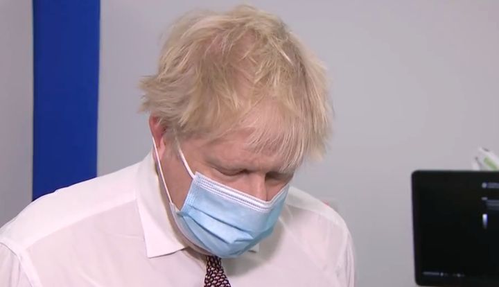 Boris Johnson put his head down during an excruciating interview on partygate.