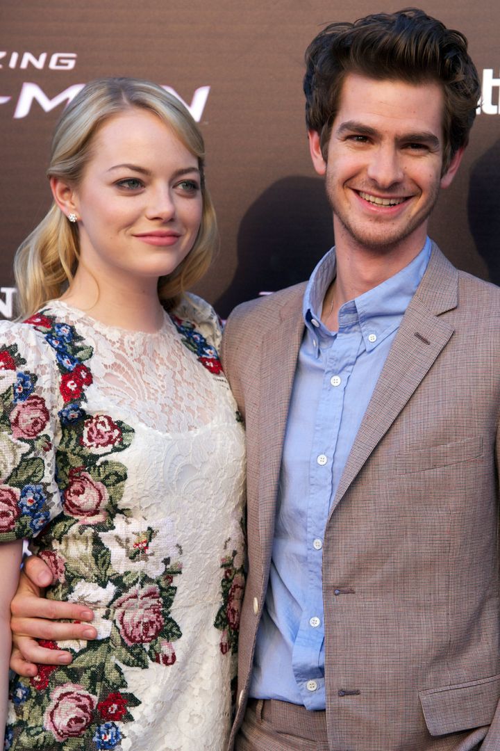 Andrew Garfield and Emma Stone attend the Madrid premiere of The Amazing Spider-Man in 2012.