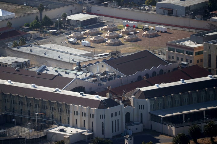 COVID-19 cases are soaring through California's prisons, where a significant number of staff members are refusing to get vaccinated. 