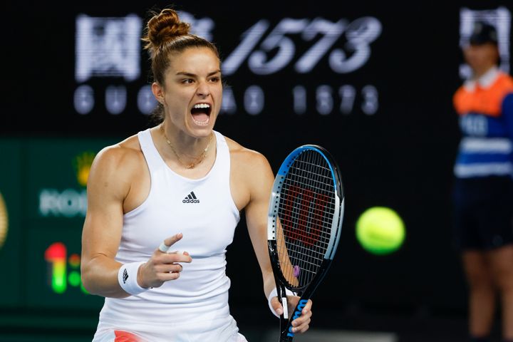 Maria Sakkari of Greece celebrates after defeating Zheng Qinwen of China in their second round match at the Australian Open tennis championships in Melbourne, Australia, Wednesday, Jan. 19, 2022. (AP Photo/Hamish Blair)