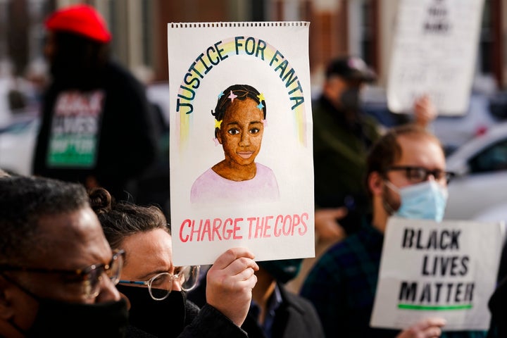 Protesters demonstrate calling for police accountability in the death of 8-year-old Fanta Bility who was shot outside a football game, at the Delaware County Courthouse in Media, Pa., on Jan. 13, 2022.