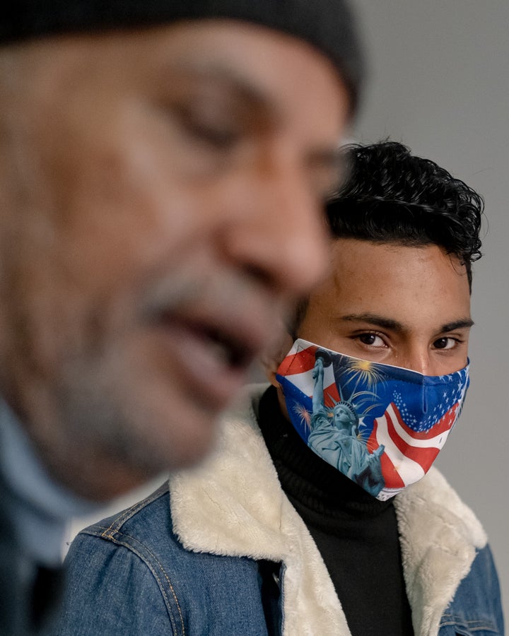 Omar Saleh stands near his father, Mohammed Saleh, while talking with HuffPost last month.