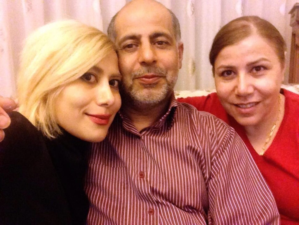 Leyla Abbasnezhad with her parents.