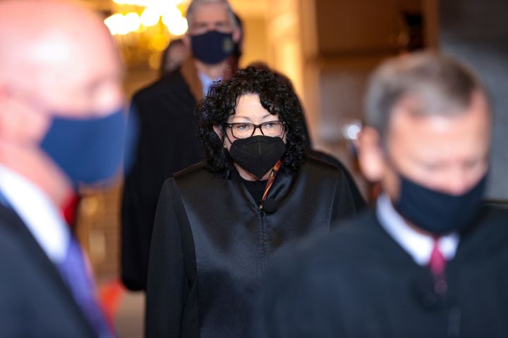 Supreme Court Justice Sonia Sotomayor, seen here wearing a mask at Biden's inauguration, joined the court's other liberals in opposing the conservative majority's decision to block OSHA's vaccine rule.