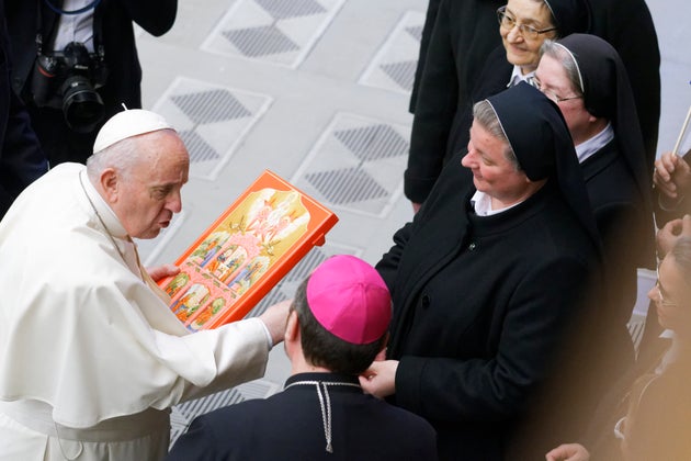 Pope Francis meets nuns during his weekly general audience at the Vatican, Wednesday, Jan. 19, 2022....