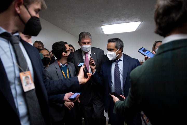 Sen. Joe Manchin (D-W.Va.) speaks to reporters on Jan. 20, 2022, in Washington, D.C. 