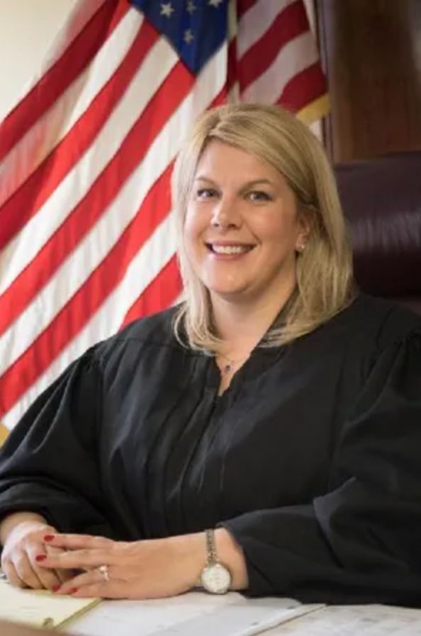 Detroit-area judge Alexis Krot has apologized for wishing that she could send a 72-year-old immigrant with cancer to jail for a weedy property.