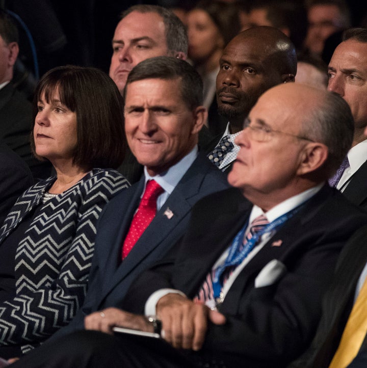 Michael Flynn and Rudy Giuliani wait for the first debate between Donald Trump and Hilary Clinton in Hempstead, New York, in September 2016.