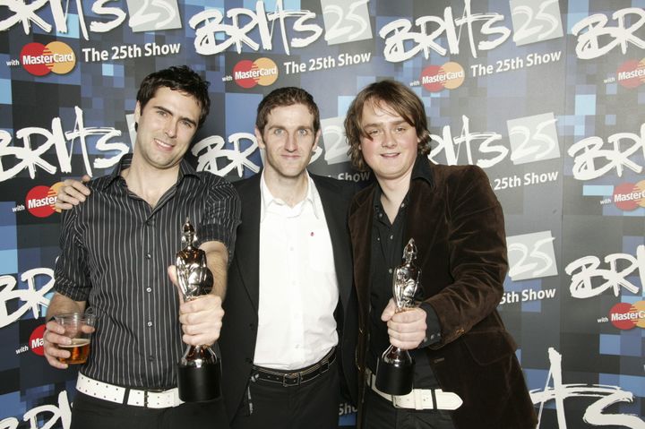 Tom with Kean bandmates Tim Rice-Oxley and Richard Huges at the 2005 Brit Awards
