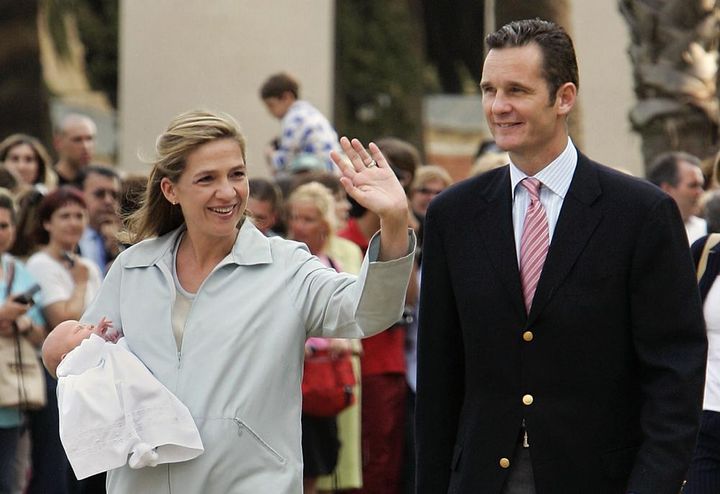 ILE - Spain's Duke of Palma Inaki Urdangarin and Princess Cristina de Borbon, left, show their daughter Irene in Barcelona, Spain, on June 8, 2005.