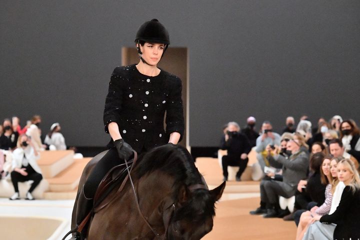 Charlotte Casiraghi rides a horse on the runway during the Chanel Haute Couture Spring/Summer 2022 show at Le Grand Palais Ephemere on Jan. 25.