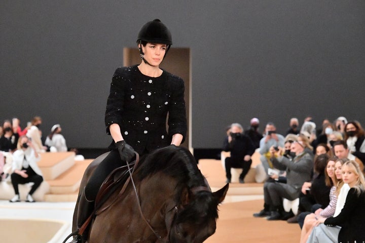 Charlotte Casiraghi rides a horse on the runway during the Chanel Haute Couture Spring/Summer 2022 show at Le Grand Palais Ephemere on Jan. 25.