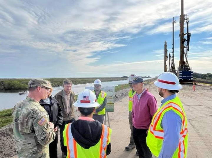 Florida Sen. Rick Scott (R) meets with local officials at Lake Okeechobee.