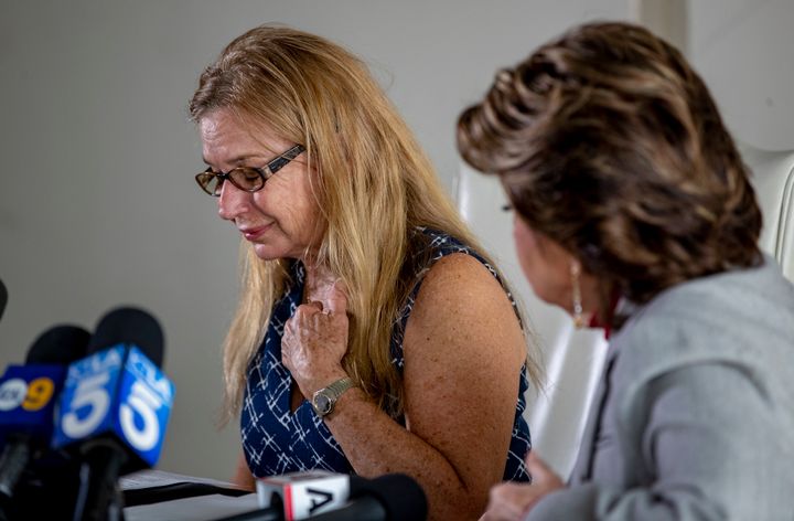 Seated next to attorney Gloria Allred, "Rust" script supervisor Mamie Mitchell, left, gets emotional when describing the events on the day of the fatal shooting.