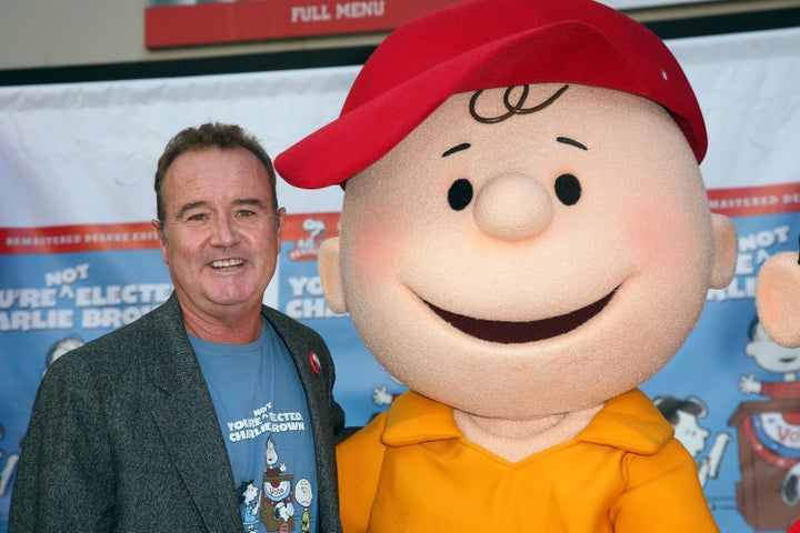 Peter Robbins, pictured with Charlie Brown in 2008, loved voicing the Peanuts character so much that he got a tattoo of Charlie Brown and Snoopy on his arm.