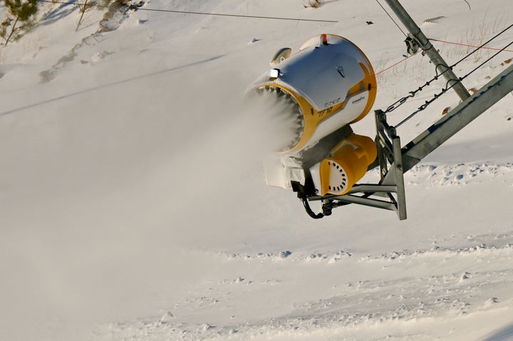 A snow gun spreading artificial snow in Beijing last month.